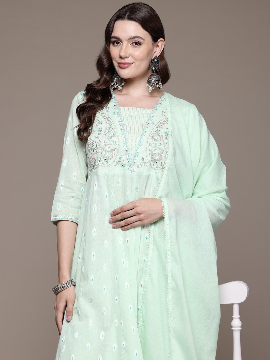 

Readiprint Fashions Floral Embroidered Empire Thread Work Pure Cotton Kurta Set, Sea green