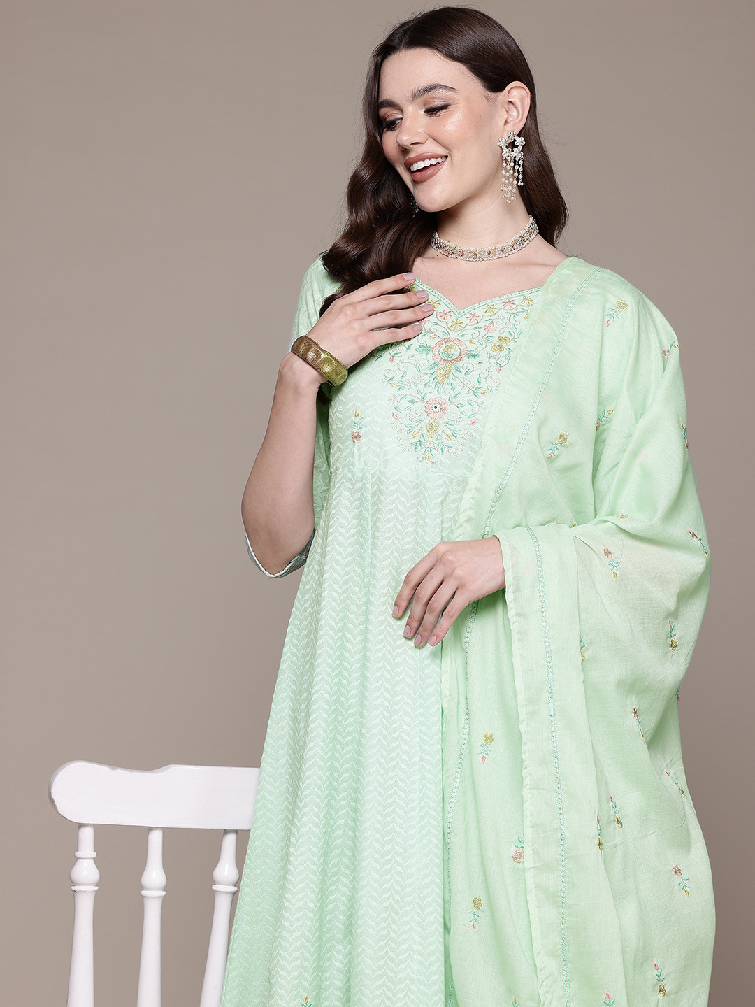 

Readiprint Fashions Floral Embroidered Empire Thread Work Pure Cotton Kurta Set, Sea green