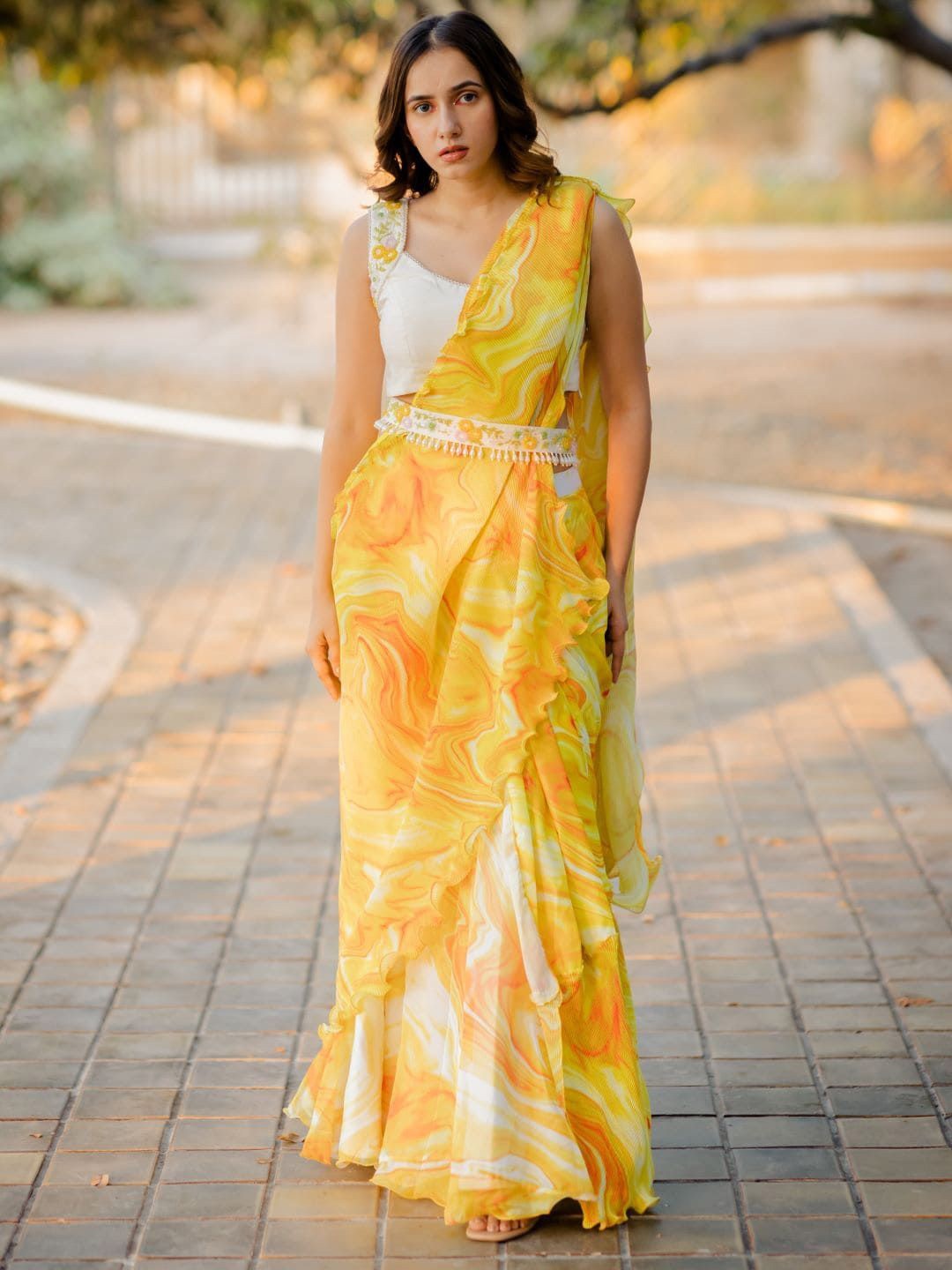 

Nikita Vishakha Abstract Printed Organza Saree, Yellow