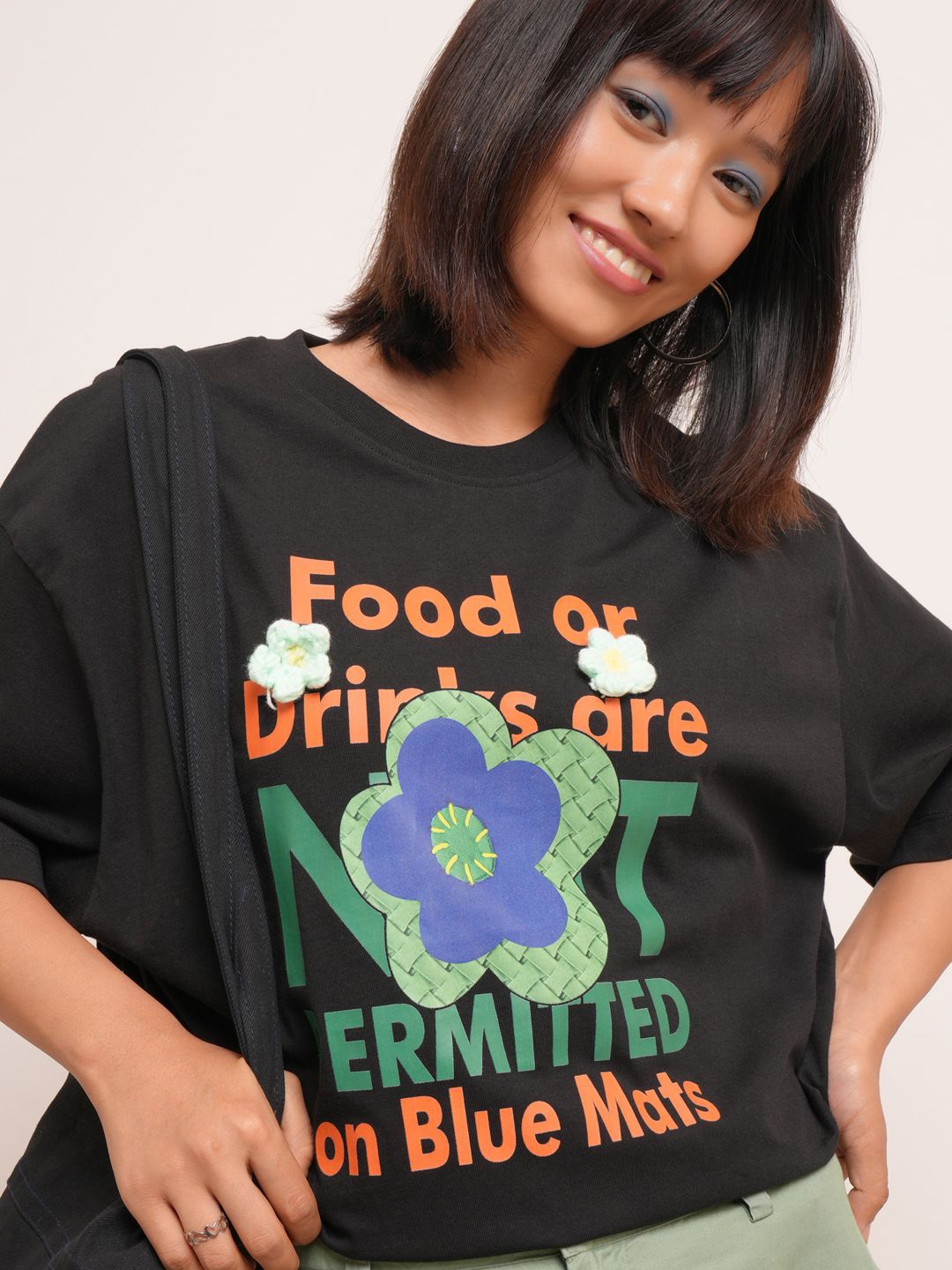 

Tokyo Talkies Women Printed Pockets T-shirt, Black