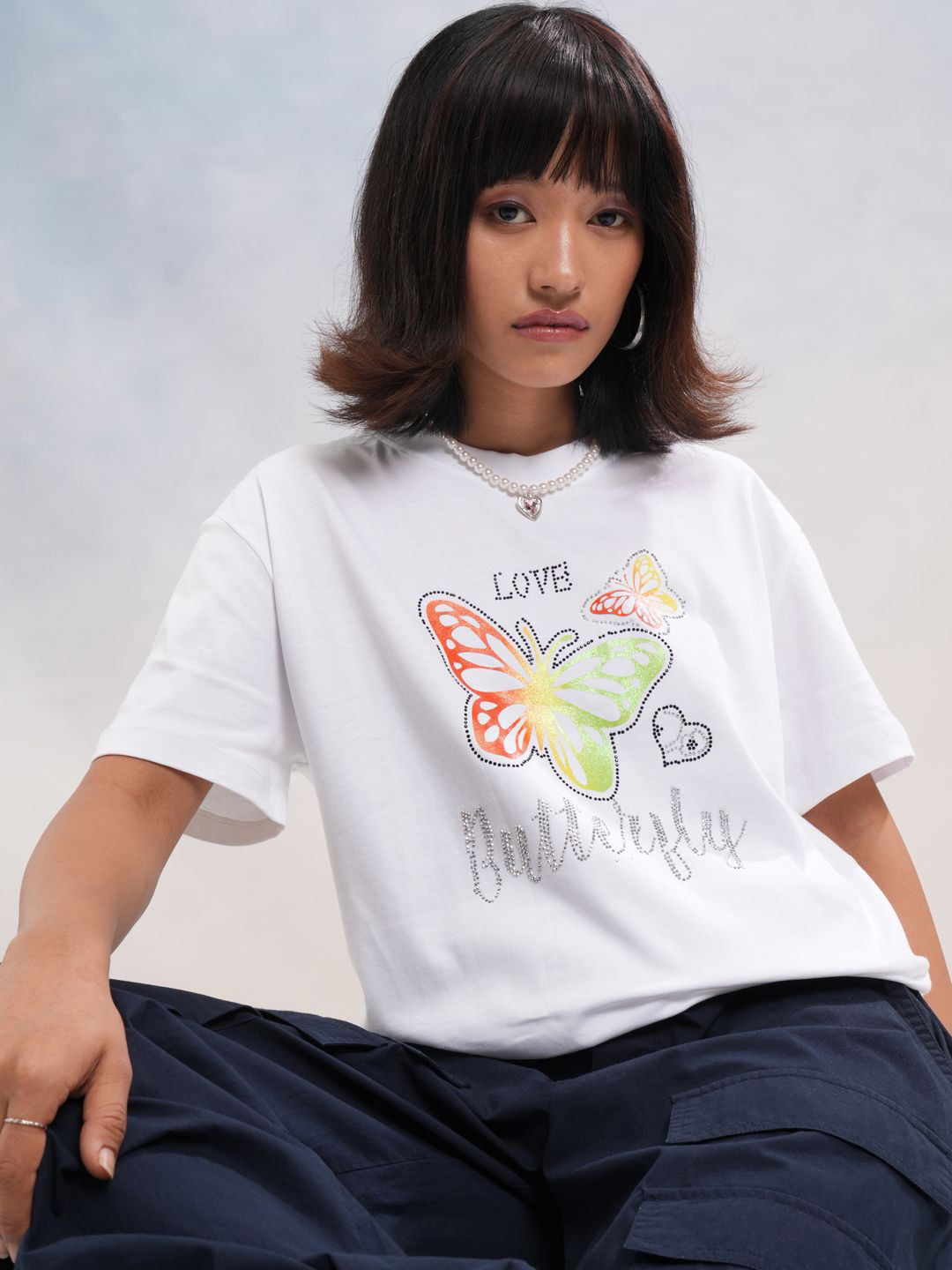 

Street By Tokyo Talkies Women Graphic Printed Drop-Shoulder Sleeves Cotton Relaxed Fit T-shirt, White