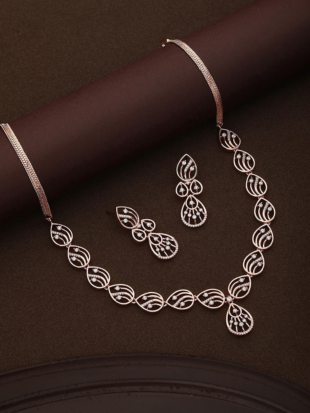 

Saraf RS Jewellery Silver Plated American Diamond Studded Jewellery Set, Rose gold