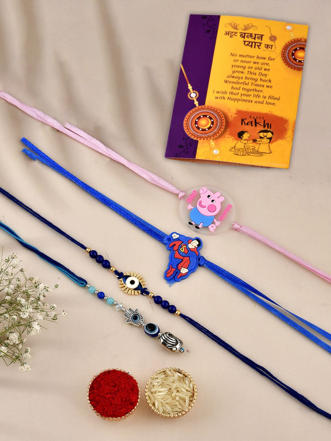 

CraftVatika Set Of 4 Beaded Rakhis With Greeting Card, Blue