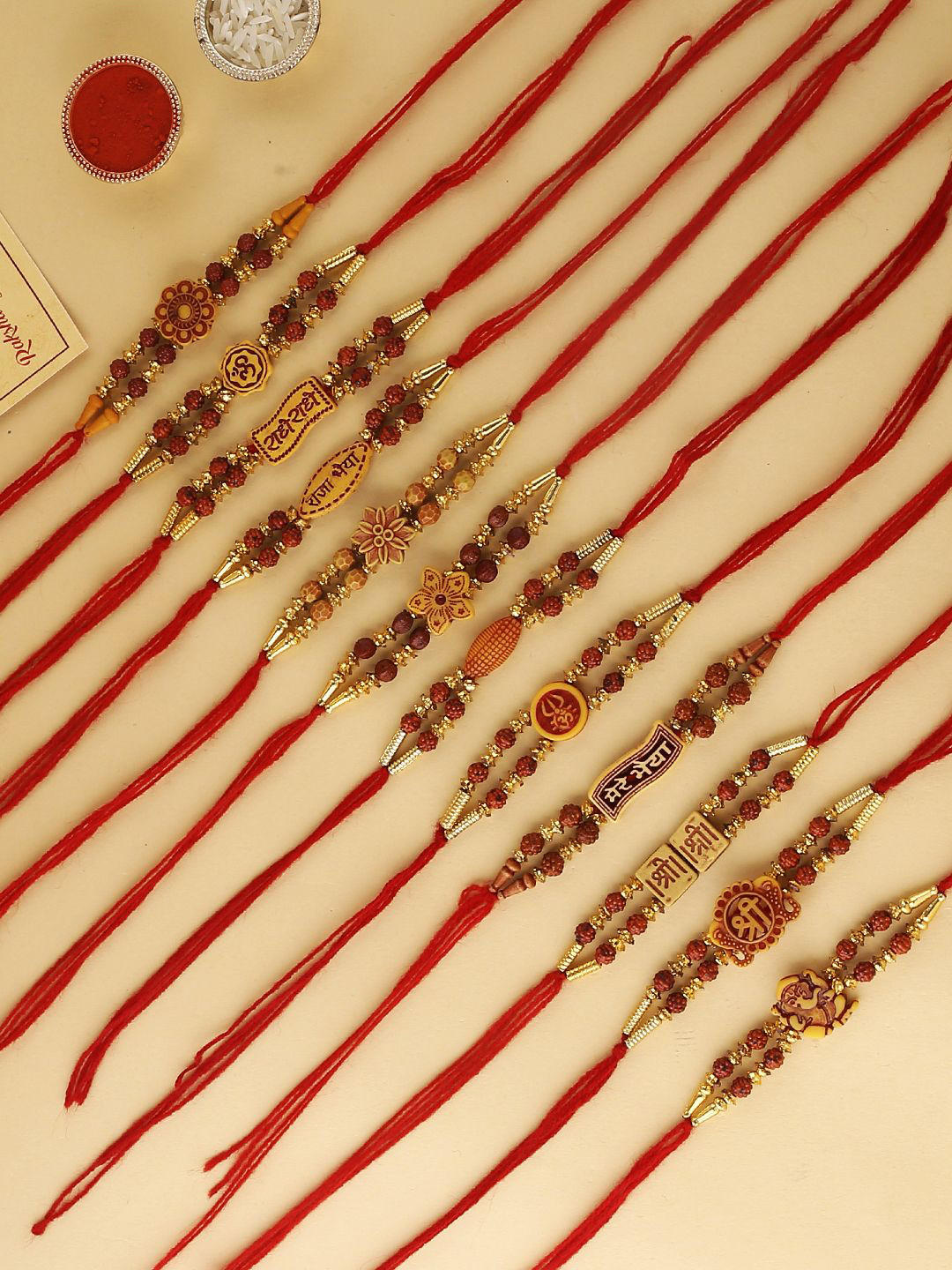 

CraftVatika Set of 12 Beaded Thread Rakhis with Greeting Card, Red
