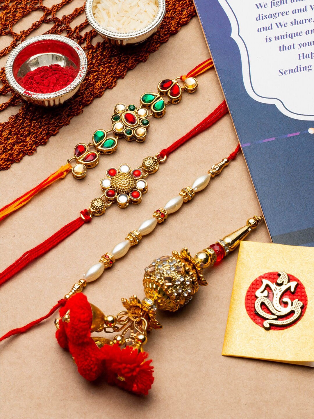 

CraftVatika Set of 4 Beaded Thread Rakhis with Greeting Card, Red