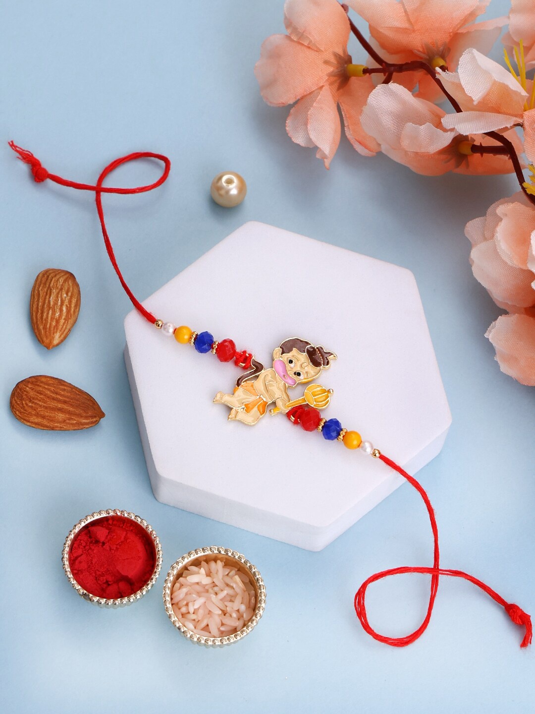 

PANASH Gold-Plated Hanuman Shaped Brass Thread Rakhi With Roli Chawal