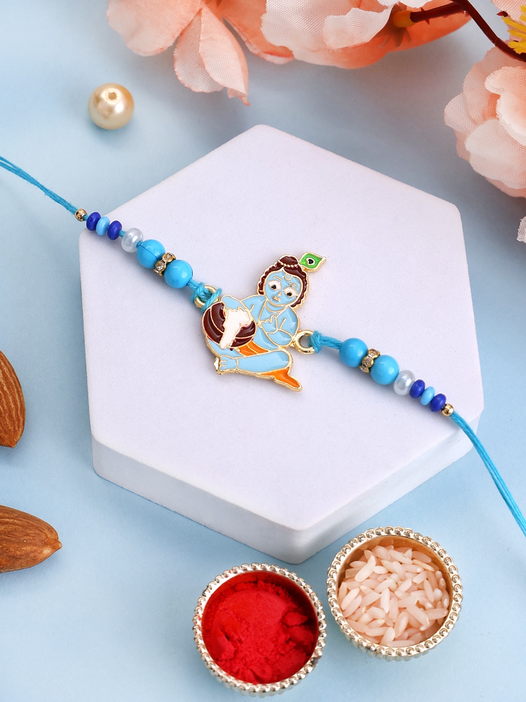 

PANASH- Gold-Plated Krishna Shaped Thread Rakhi With Roli Chawal
