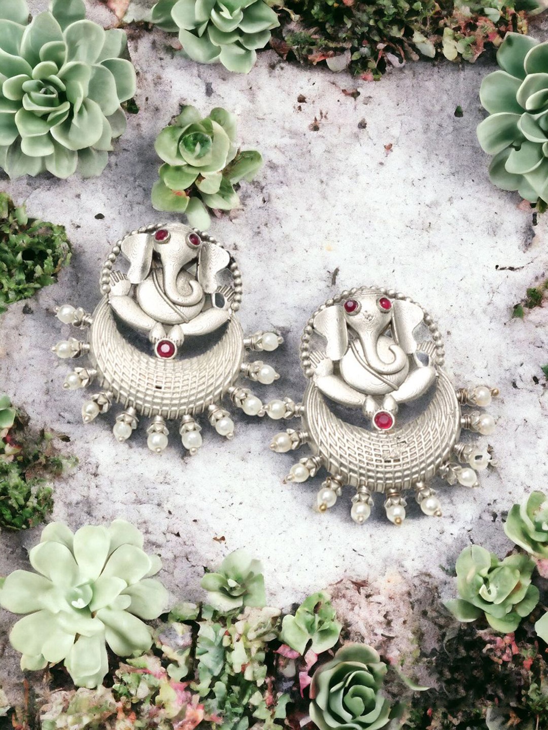 

Ozanoo Silver-Plated Crystals Contemporary Studs Earrings