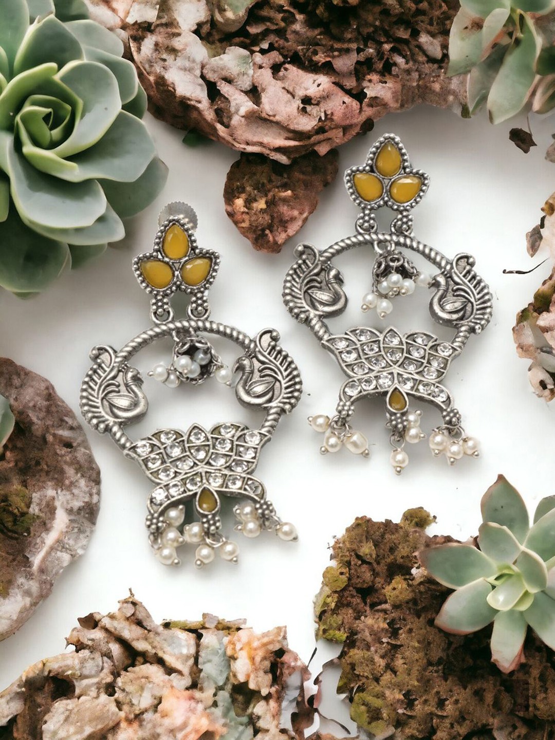 

Ozanoo Silver-Plated Cubic Zirconia Contemporary Drop Earrings