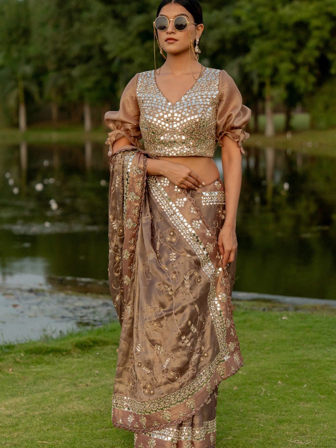 

Nikita Vishakha Embellished Mirror Work Tissue Saree, Bronze