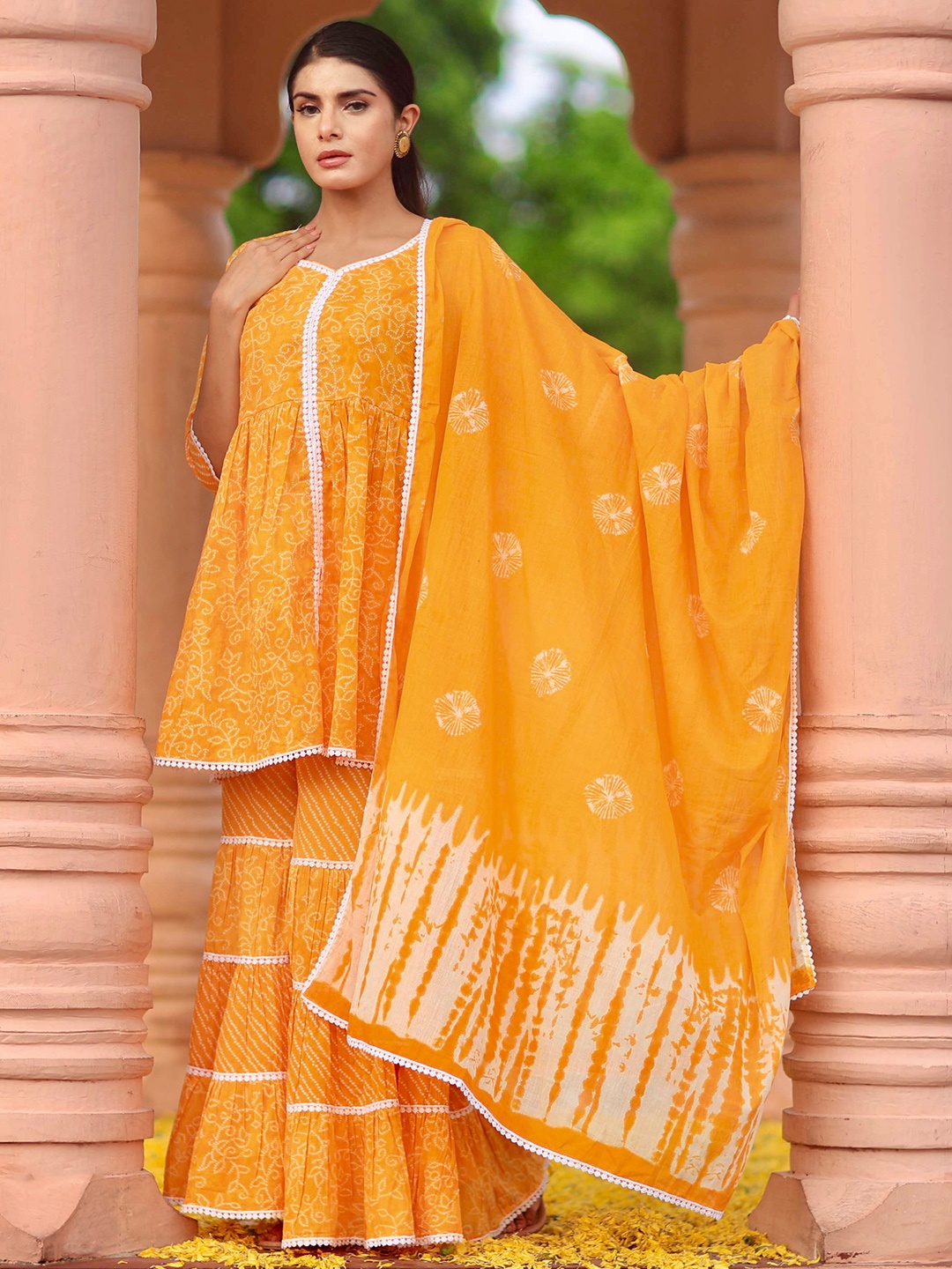 

Libas Mustard Bandhani Printed Pleated Pure Cotton Kurti with Sharara & Dupatta