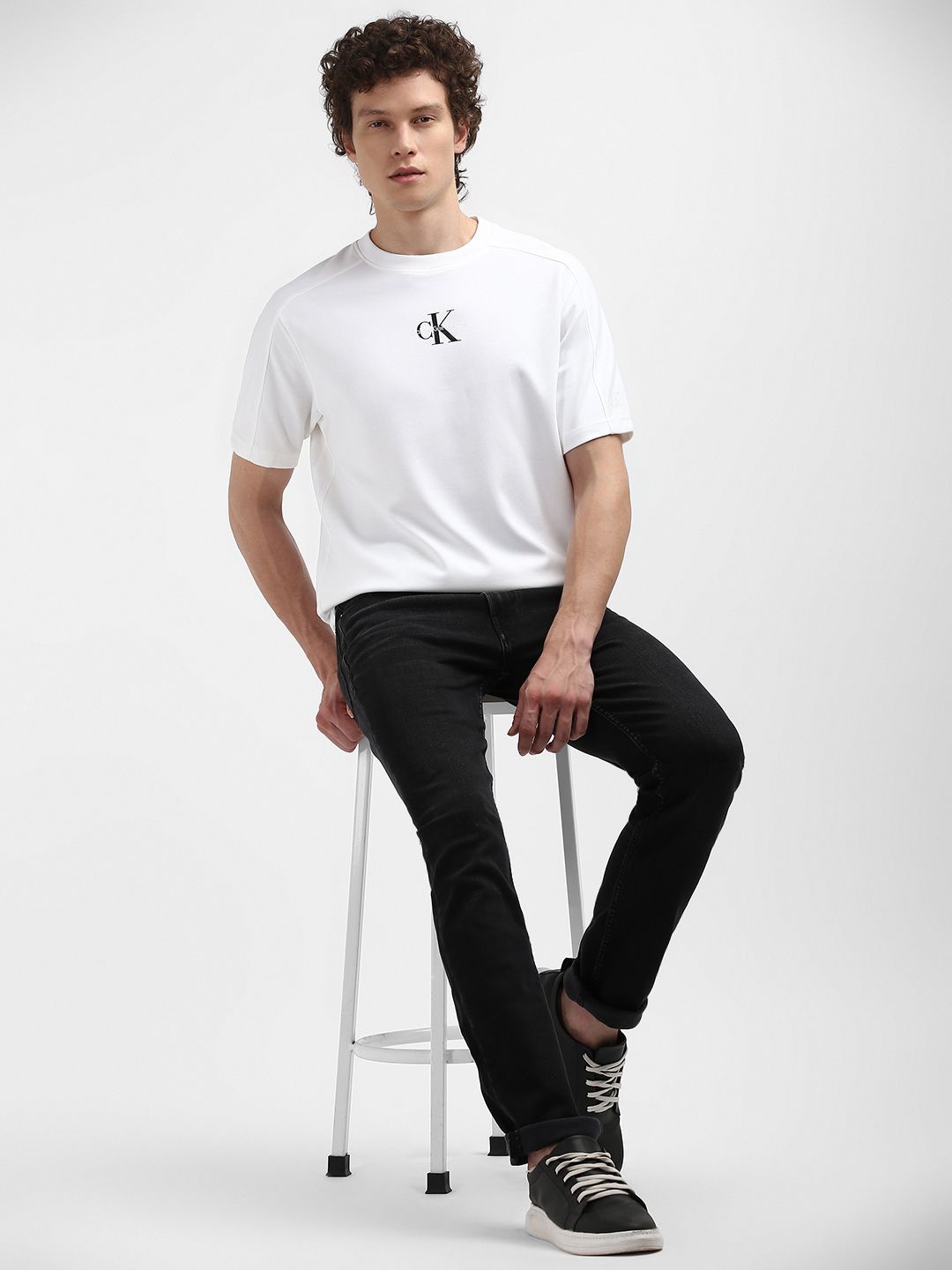 

Calvin Klein Men Solid Round Neck T-shirt, White