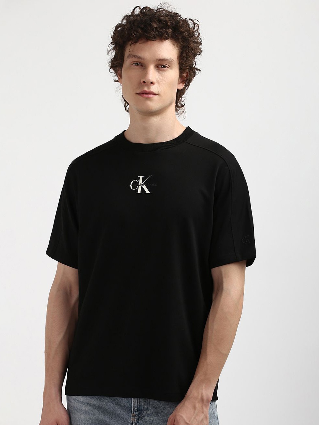 

Calvin Klein Men Solid Round Neck T-shirt, Black