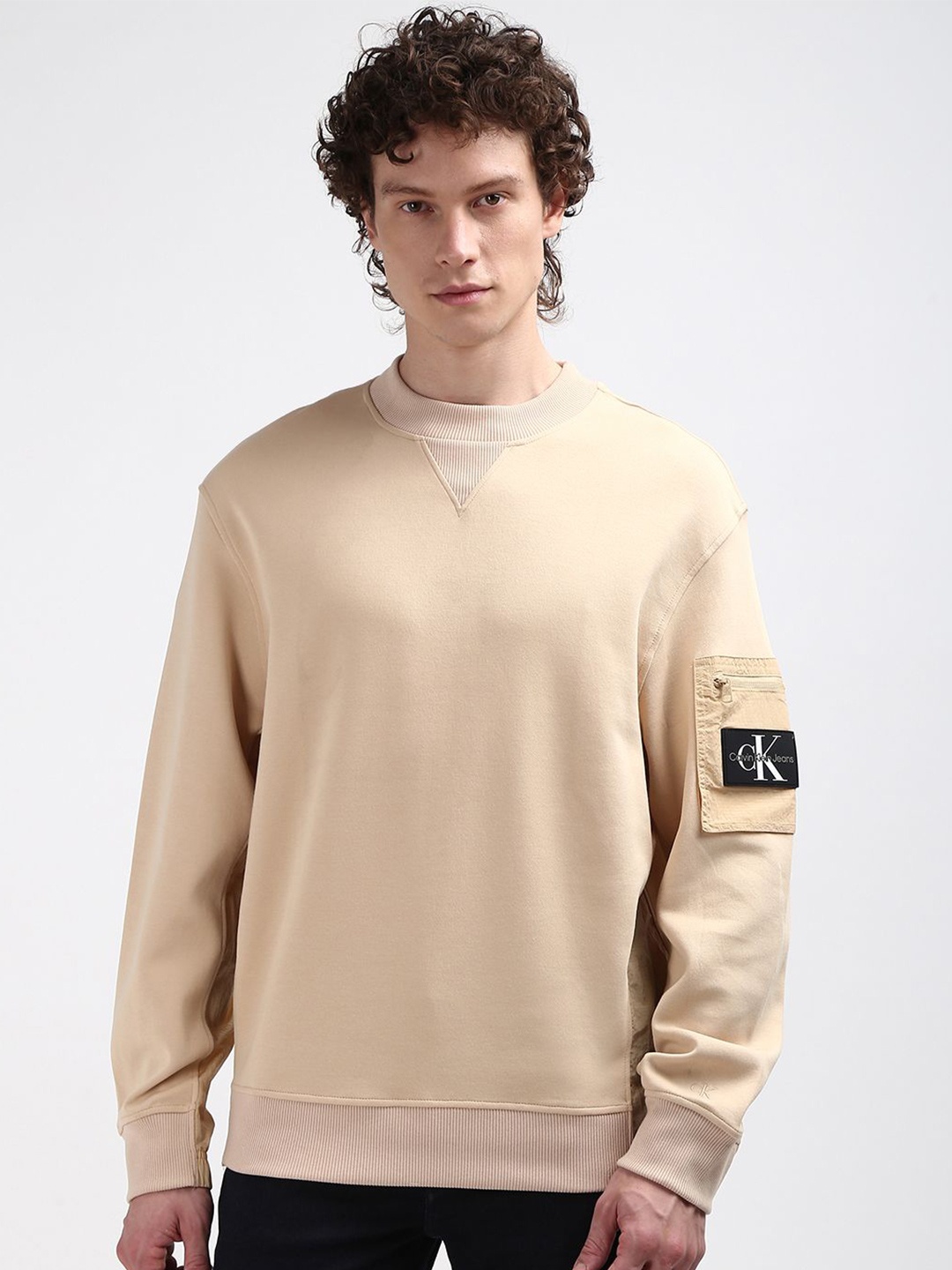 

Calvin Klein Men Cotton Solid Sweatshirt, Beige