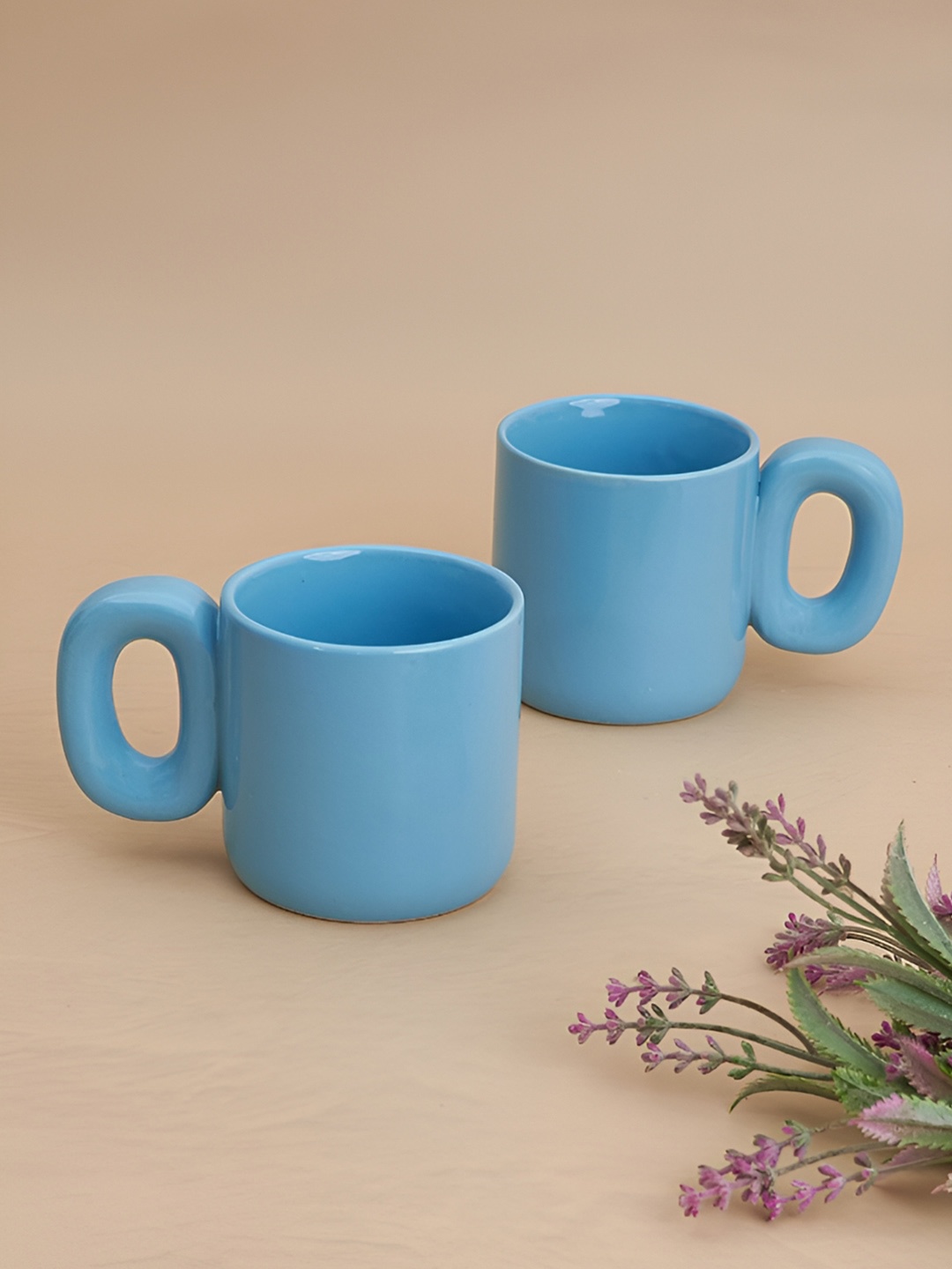 

NURTURE INDIA Blue 2 Pieces Printed Ceramic Glossy Mugs 300 ml