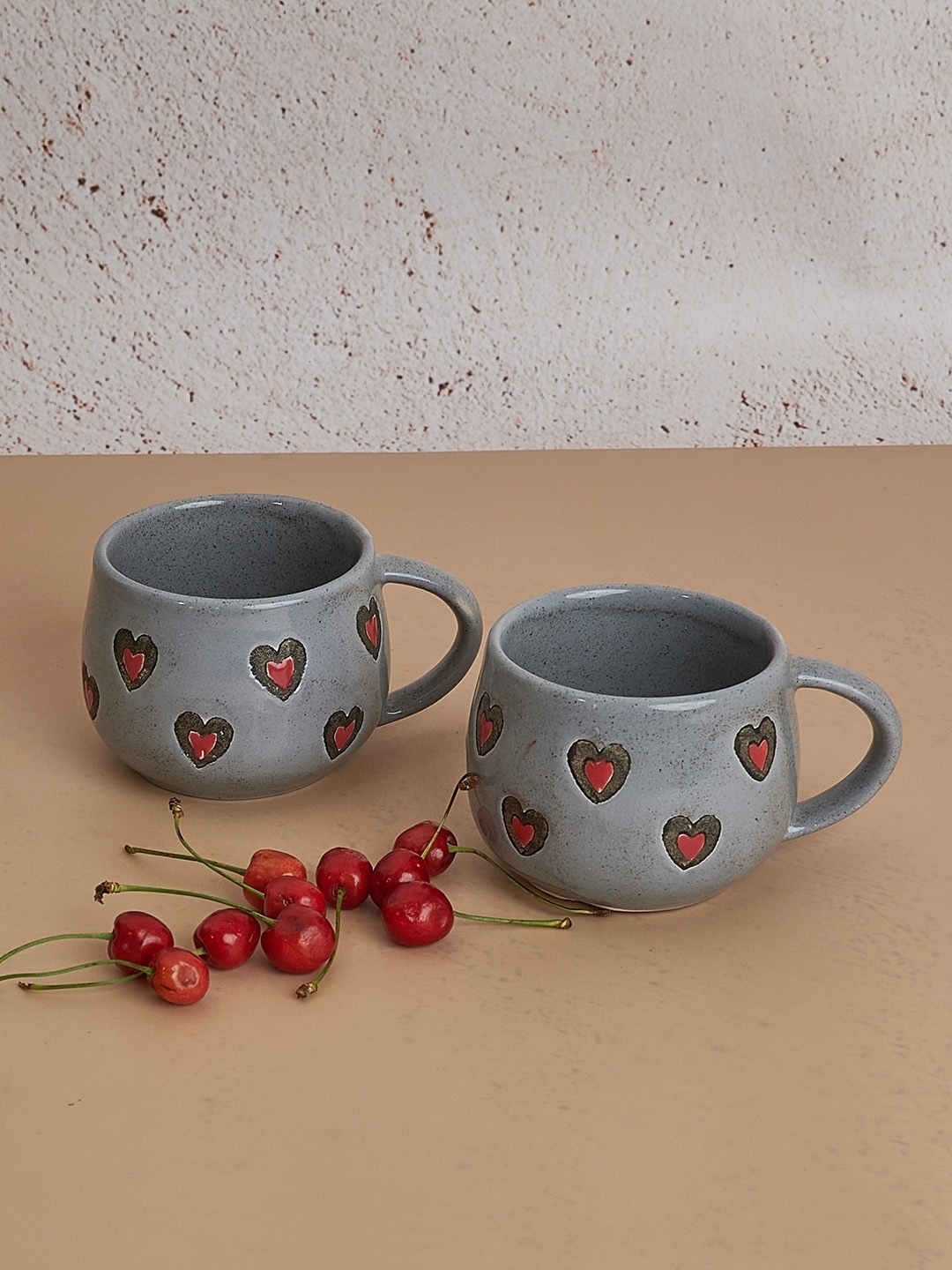 

NURTURE INDIA Grey & Red 2 Pieces Printed Ceramic Matte Mugs 180 ml