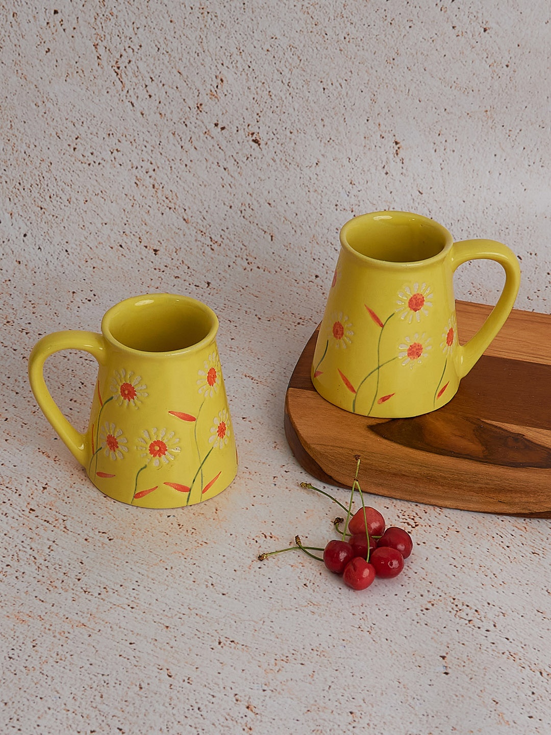 

NURTURE INDIA Yellow & Red 2 Pieces Printed Ceramic Matte Mugs 250 ml