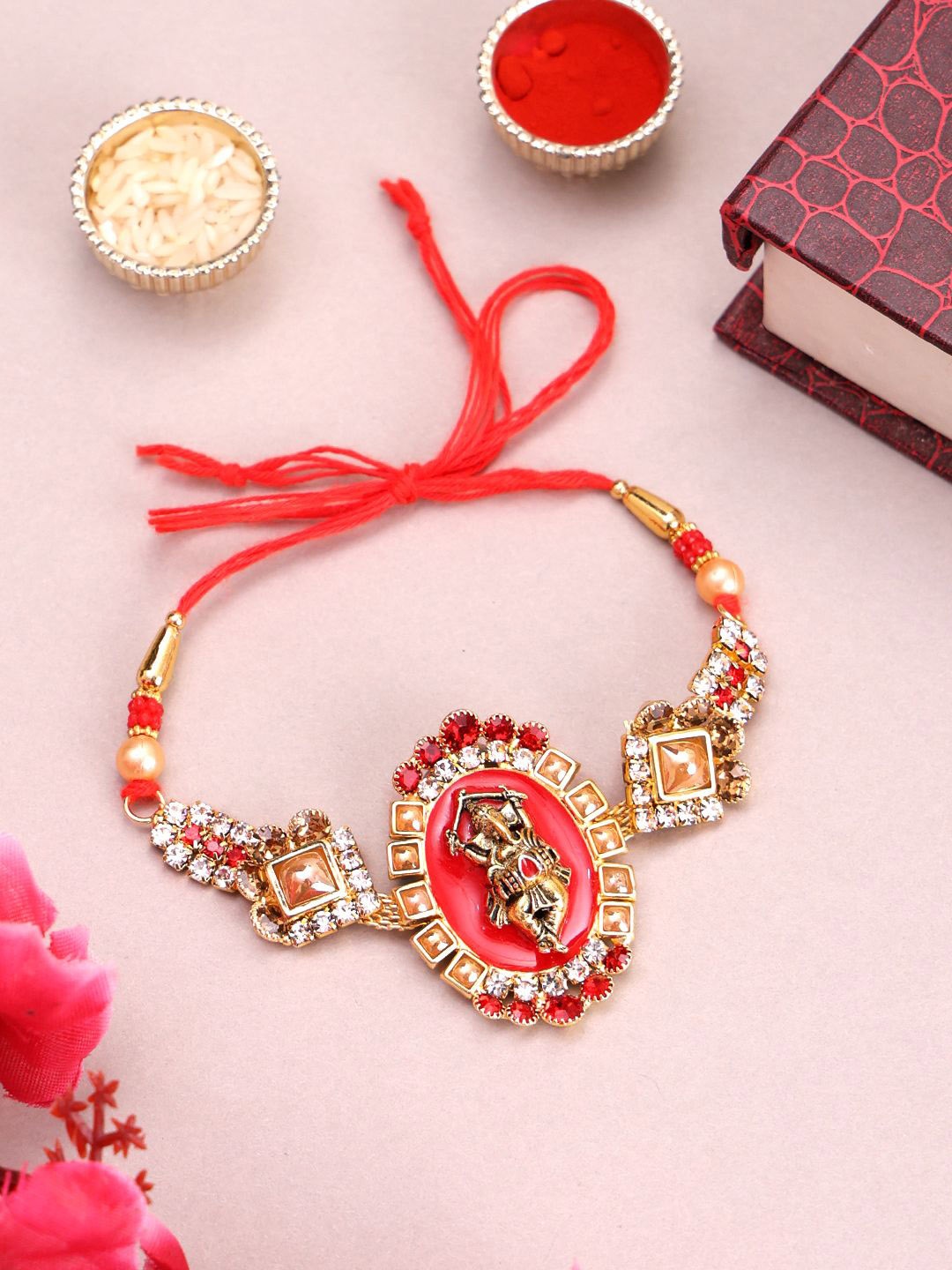 

PANASH Gold Plated Ganesh Shaped Beads & Stone Studded Rakhi With Roli Chawal
