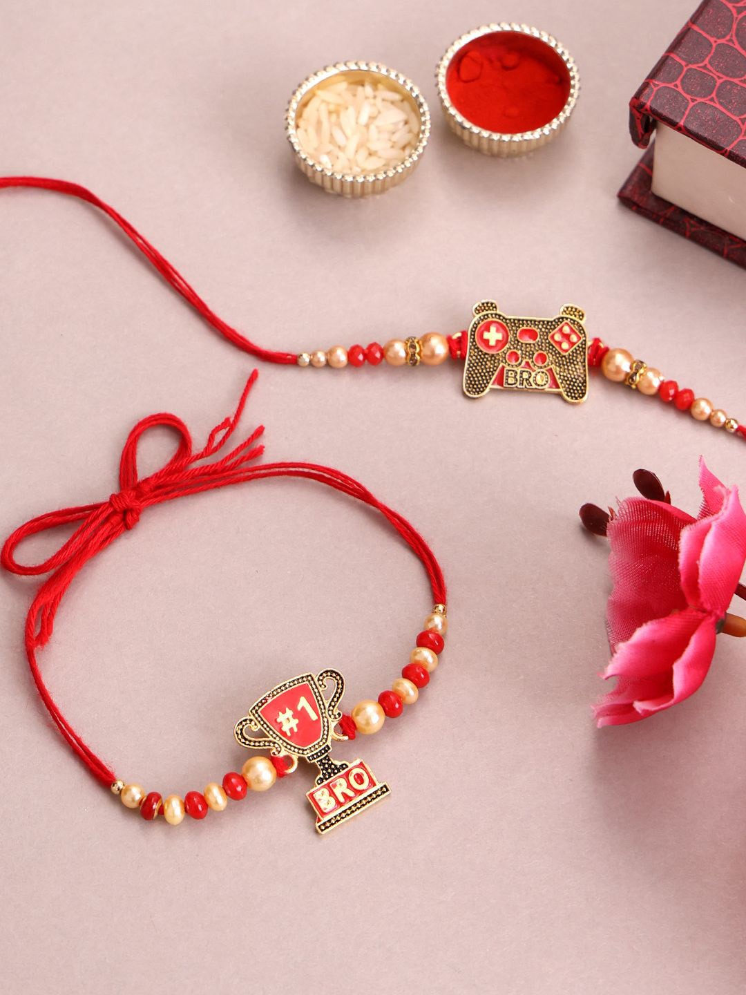 

PANASH Set Of 2 Gold Plated Name Of Bro Rakhis With Roli Chawal