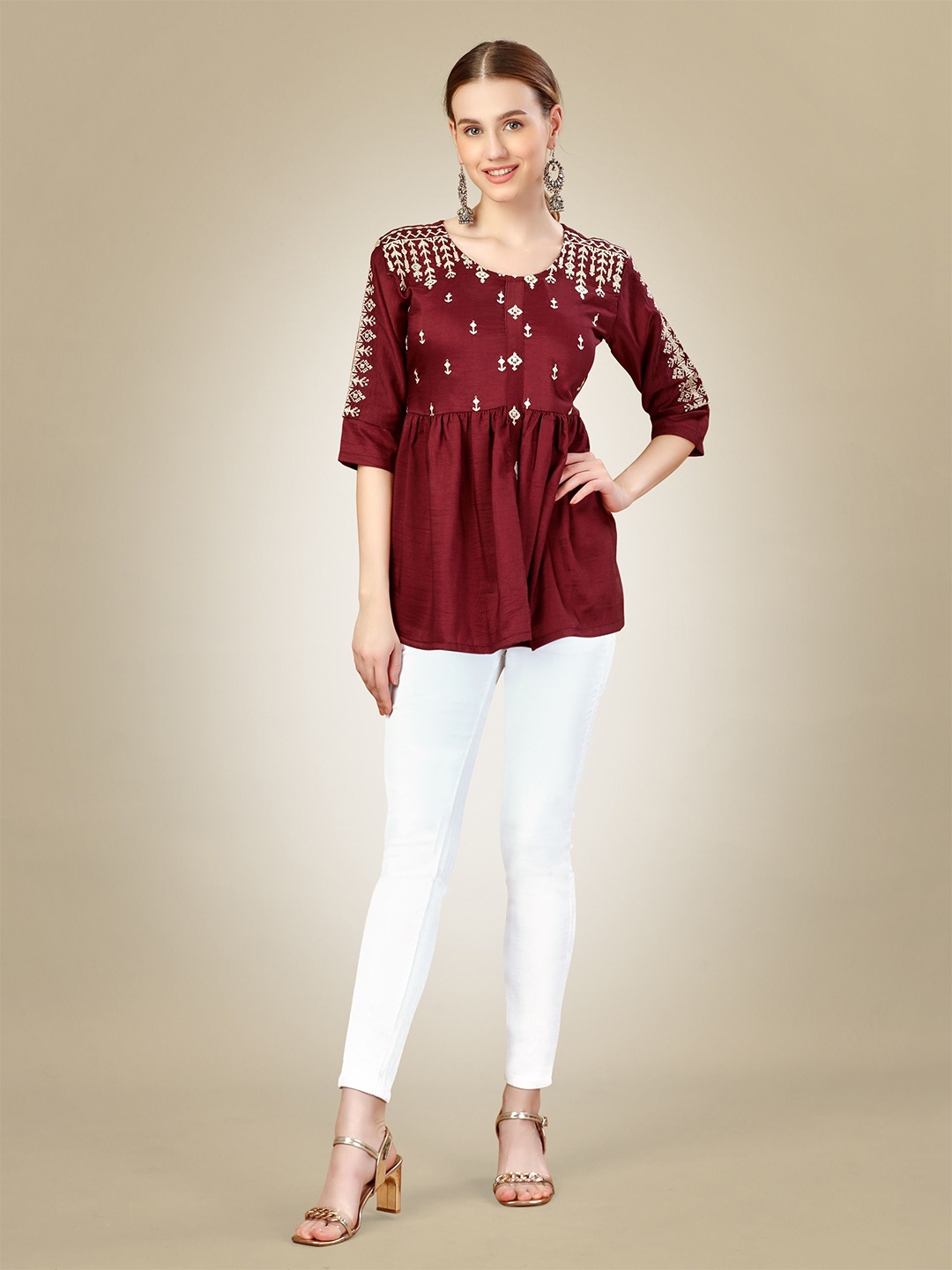 

Rujave Women Ethnic Motifs Embroidered A-Line Top, Rust