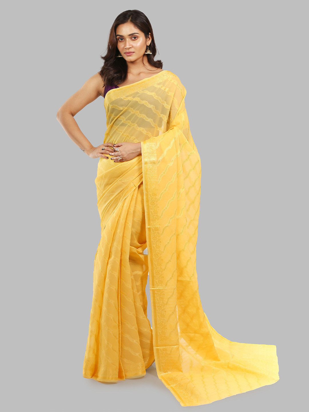 

Urbane Essence Woven Design Pure Georgette Saree, Yellow