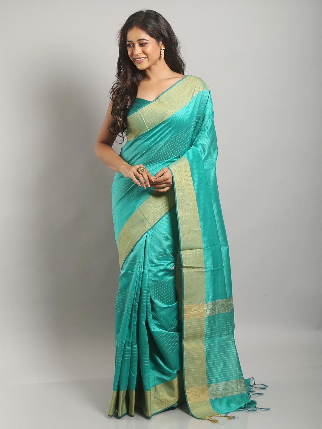 

Urbane Essence Striped Zari Pure Silk Saree, Green