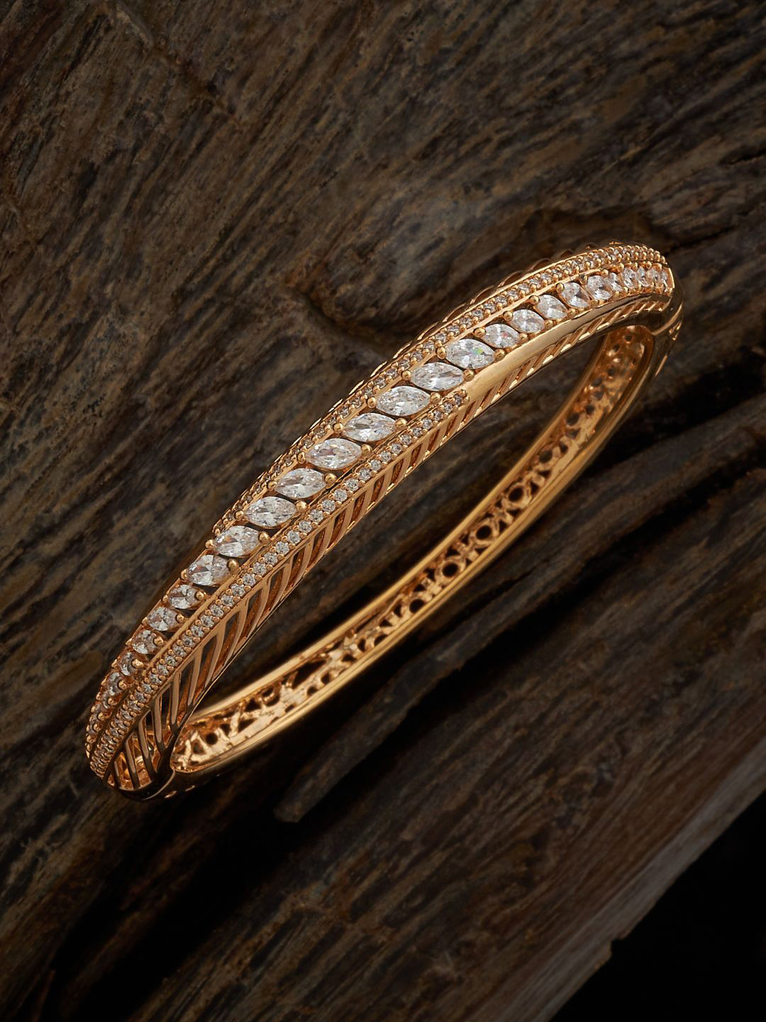 

Kushal's Fashion Jewellery Cubic Zirconia Gold-Plated Kada Bracelet
