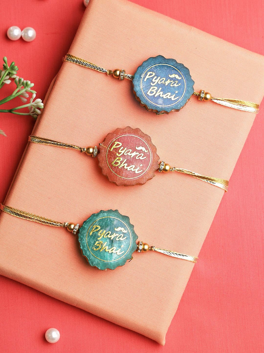 

Aapno Rajasthan Set Of 3 Pyara Bhai Rakhis With Roli Chawal & Greeting Card, Green
