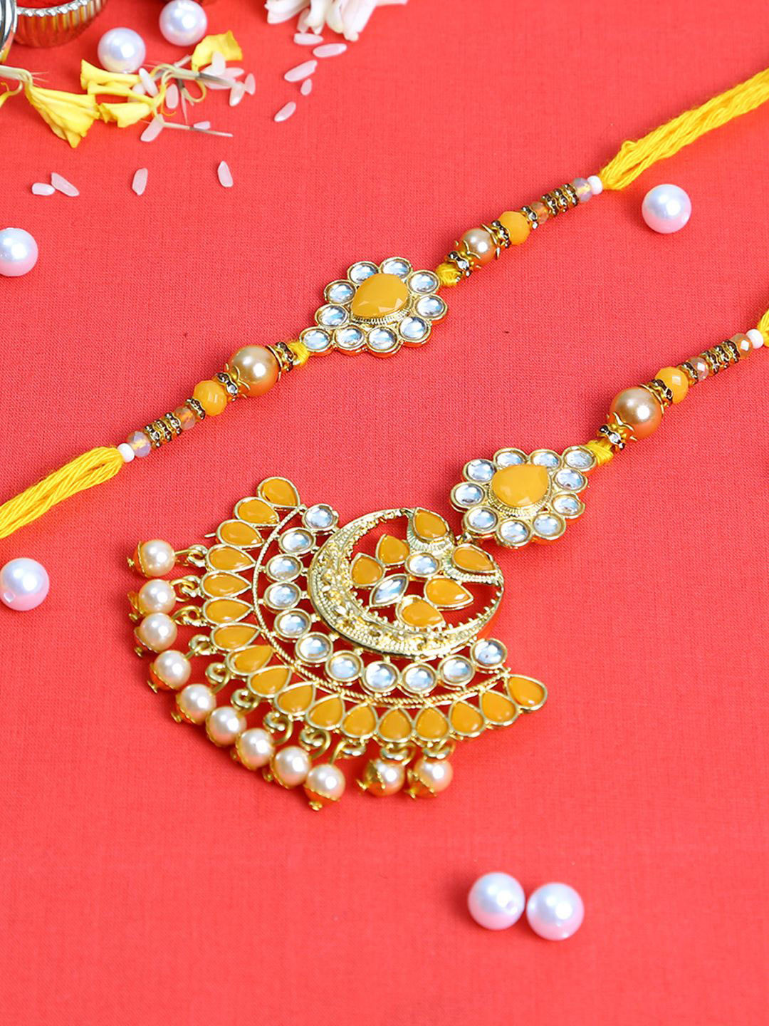 

Aapno Rajasthan Stone Sudded & Beaded Bhaiya Bhabhi Rakhi With Roli Chawal & Greeting Card, Yellow