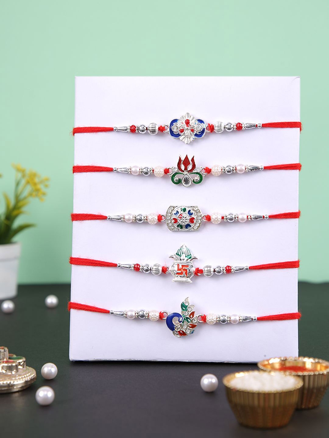 

Aapno Rajasthan Set Of 5 Beaded Rakhis With Rholi Chawal & Greeting Card, Silver