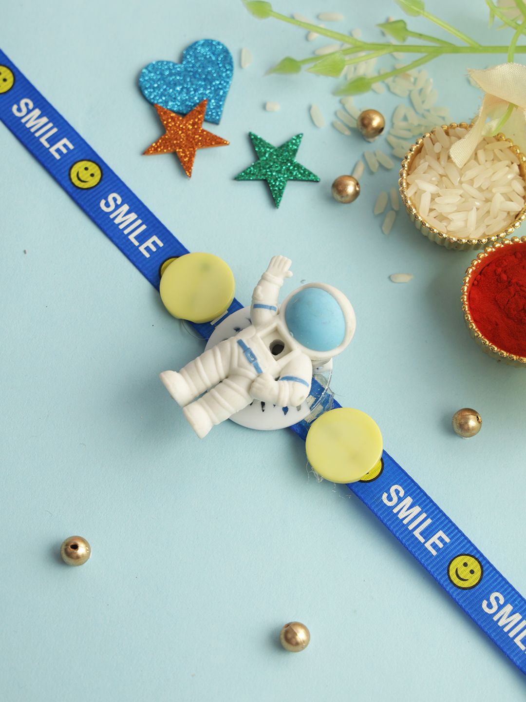 

Aapno Rajasthan Astronaut Adventure Rakhi With Roli Chawal & Greeting Card, White