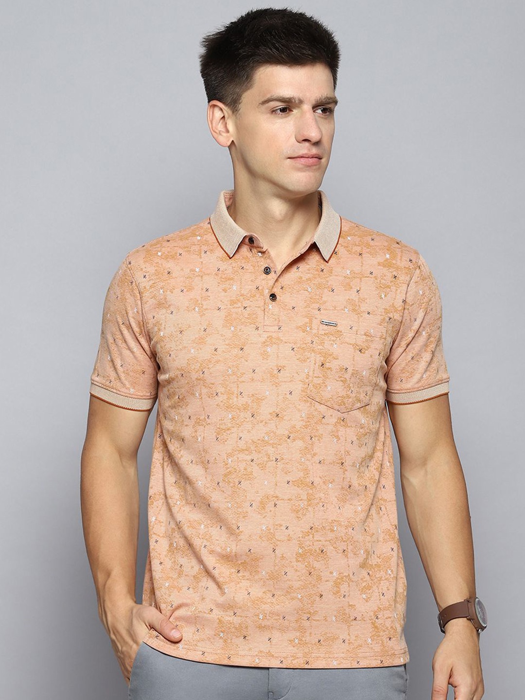 

Cloak & Decker by Monte Carlo Men Abstract Printed Polo Collar Pocket T-shirt, Peach