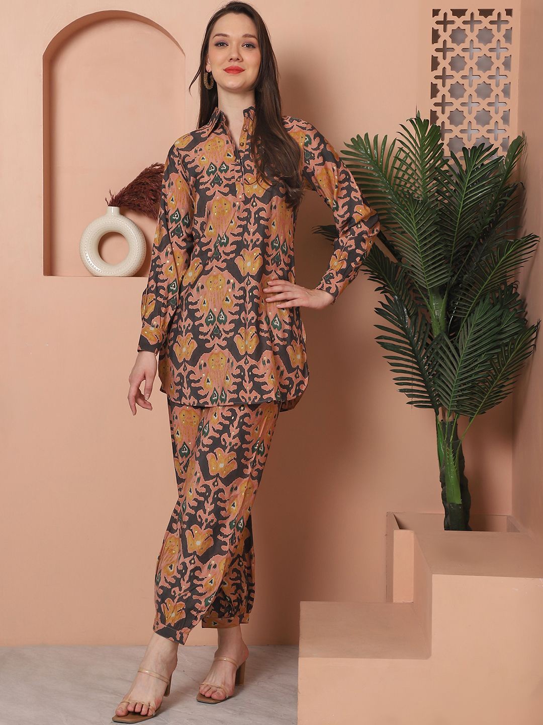 

Claura Peach & Purple Ethinic Motifs Printed Shirt Collar Tunic With Trousers