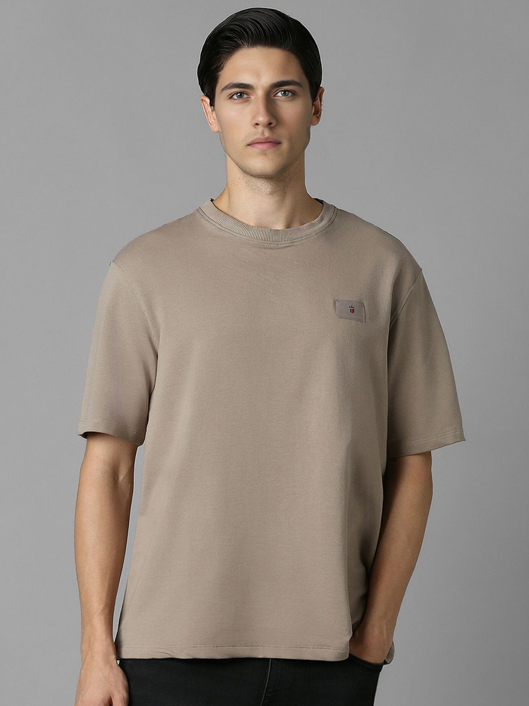 

Louis Philippe Jeans Men Solid Round Neck Relaxed Fit T-shirt, Brown