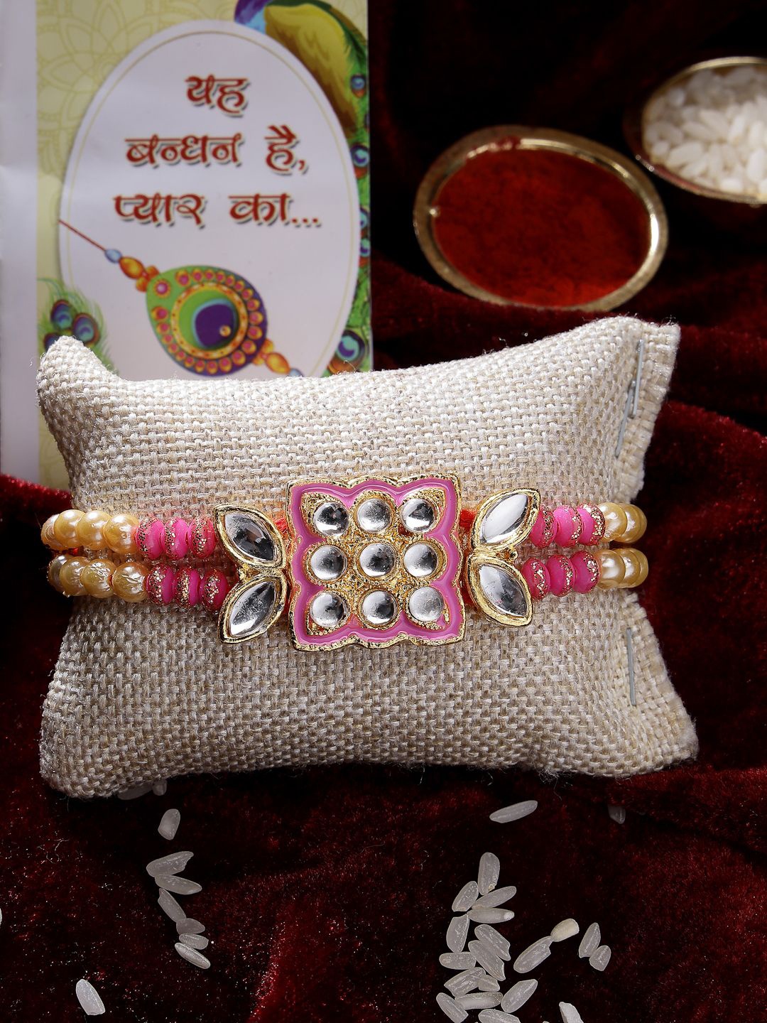 

NVR Kundan-Studded Rakhi With Chocolate & Greeting Card with Roli Chawal, Pink