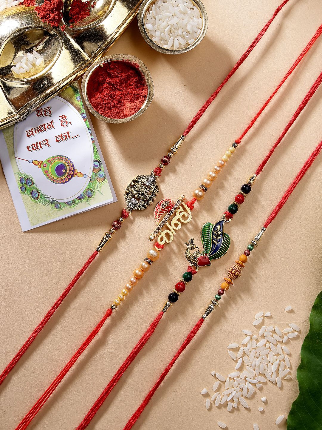 

NVR Set of 4 Radha Krishna & Peacock Design Rakhis With Chocolate & Card with Roli Chawal, Red