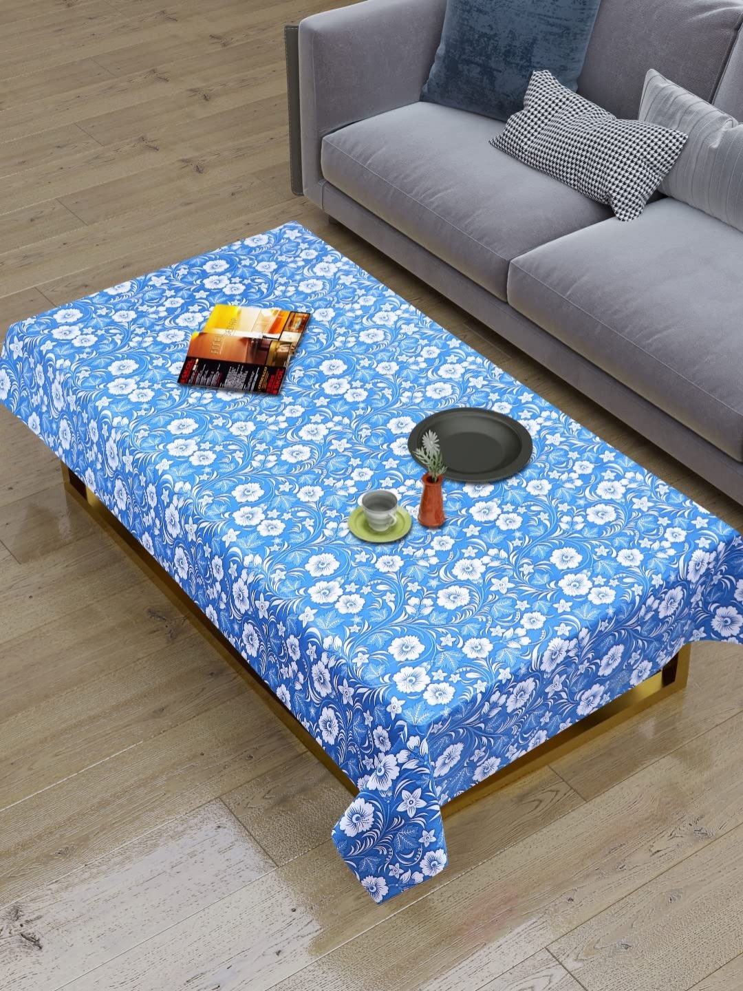 

Dakshya Industries Blue Floral Printed Rectangle Shaped Waterproof 4-Seater Table Cover