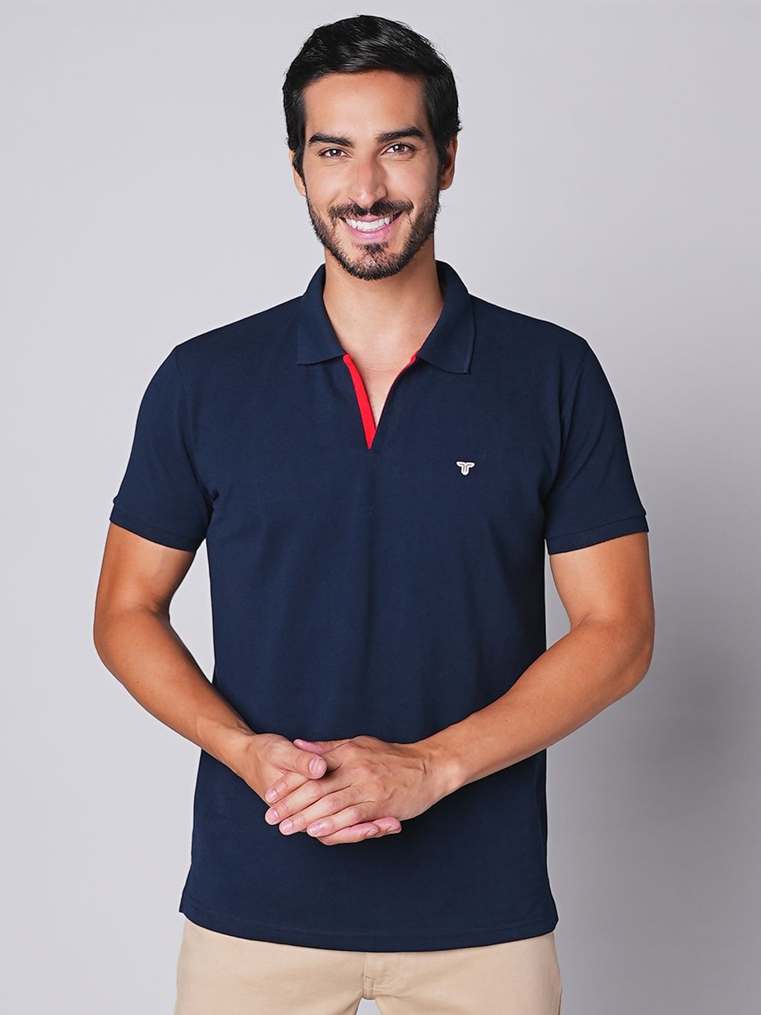 

TESSIO Men Solid Polo Collar T-shirt, Blue