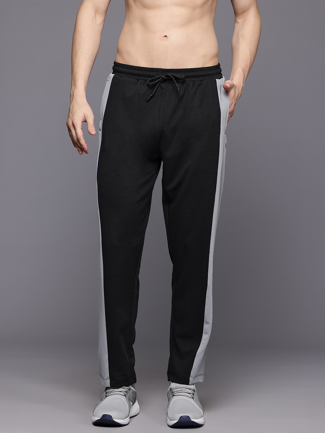 

HRX by Hrithik Roshan Men Solid Track Pant, Black