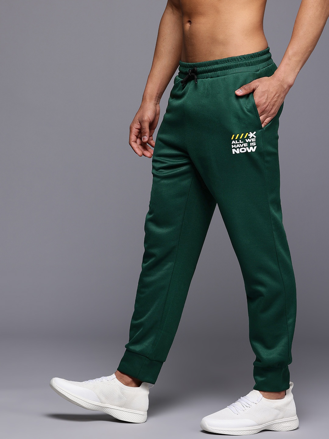 

HRX by Hrithik Roshan Lifestyle Typography Printed Joggers, Green