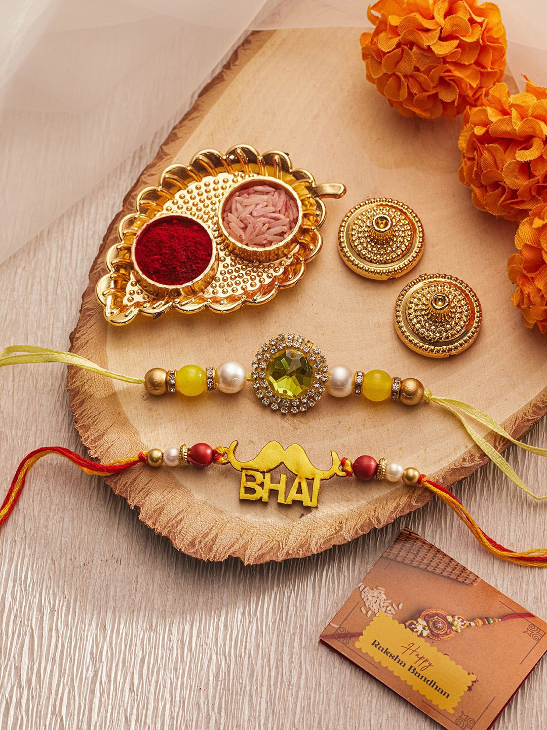 

Saraf RS Jewellery Set Of 2 Gold Bhai Thread Rakhi With Roli Chawal Pooja Plate