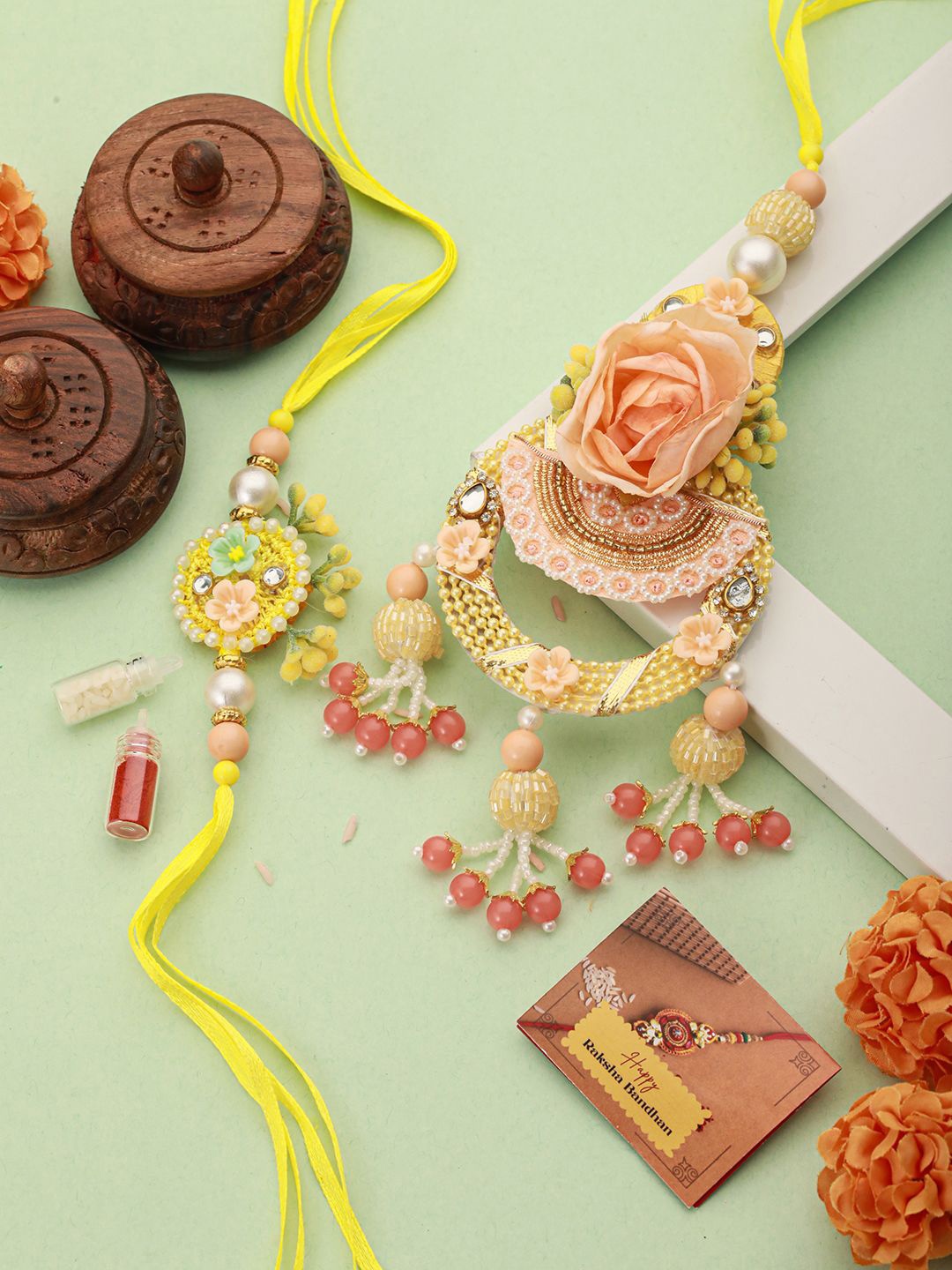 

Saraf RS Jewellery Set of 2 Flower Rakhi For Bhaiya & Bhabhi Lumba Rakhis with Roli Chawal, Peach