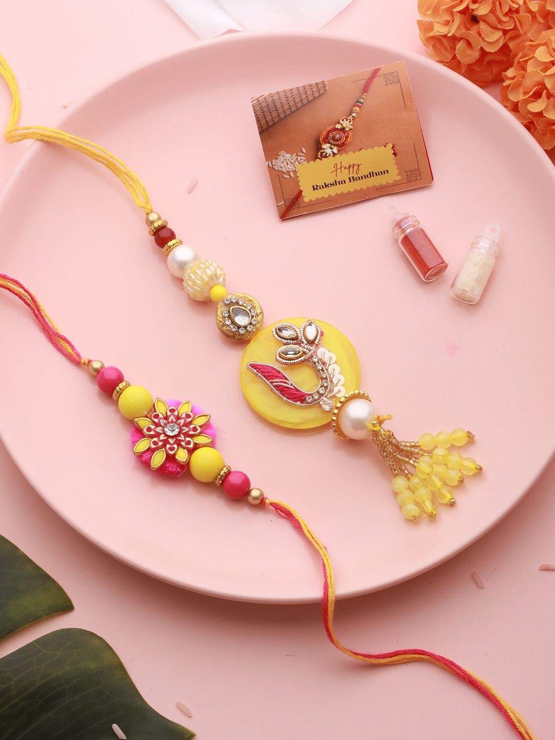 

Saraf RS Jewellery Set of 2 Bhaiya & Bhabhi Rakhis with Roli Chawal & Greeting Card, Gold