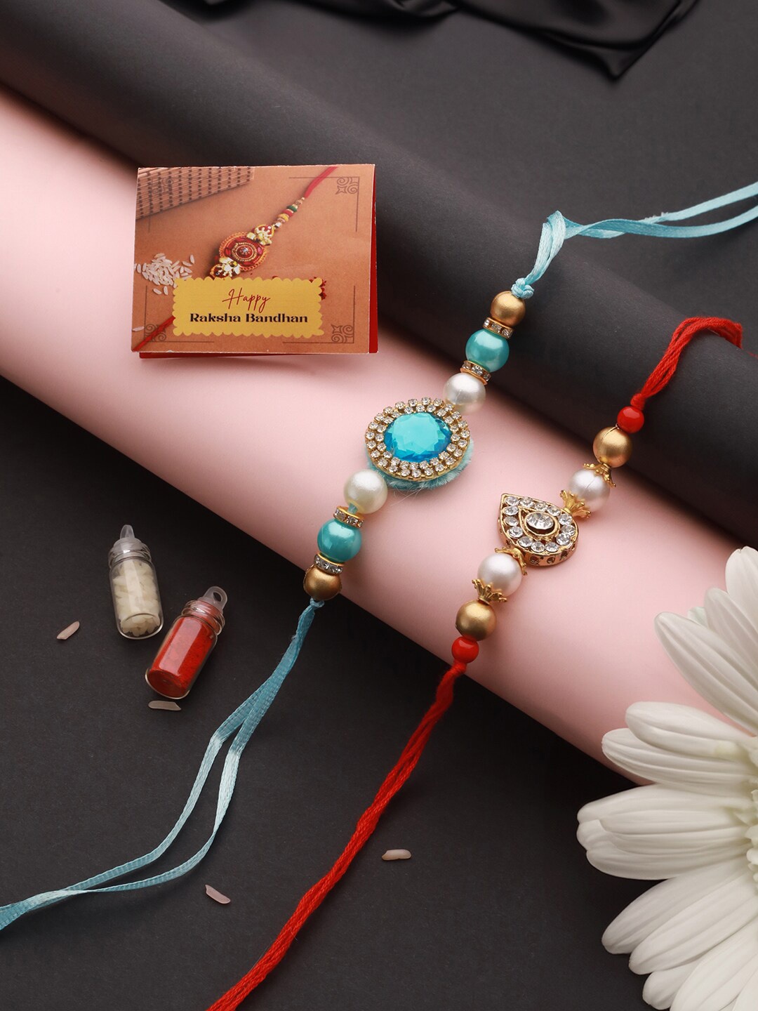 

Saraf RS Jewellery Set of 2 Kundan & AD Studded Rakhi With Roli Chawal & Greeting Card, Gold