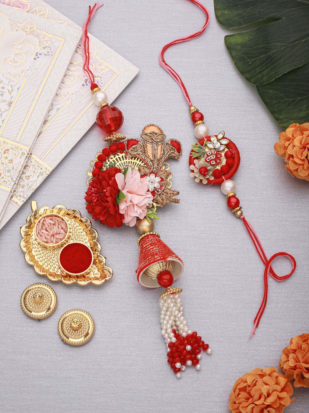 

Saraf RS Jewellery Set of 2 Kundan Zardozi Lumba Rakhi Set With Roli Chawal Pooja Plate, Red