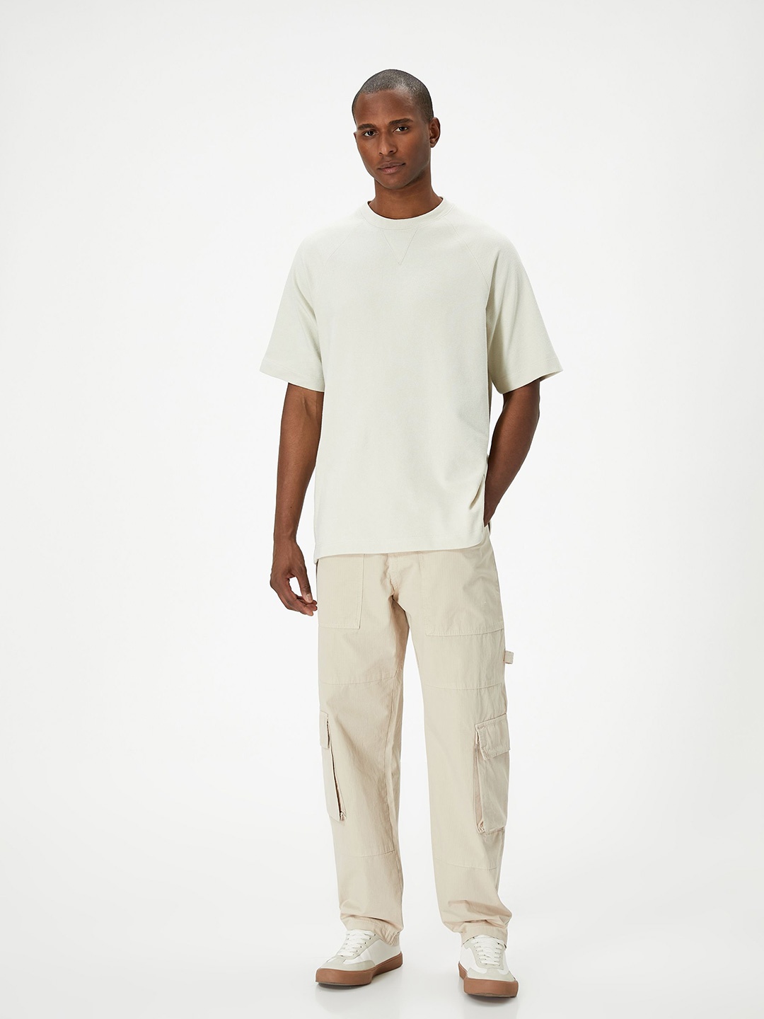 

Koton Men Solid Round Neck Pure Cotton T-shirt, Beige