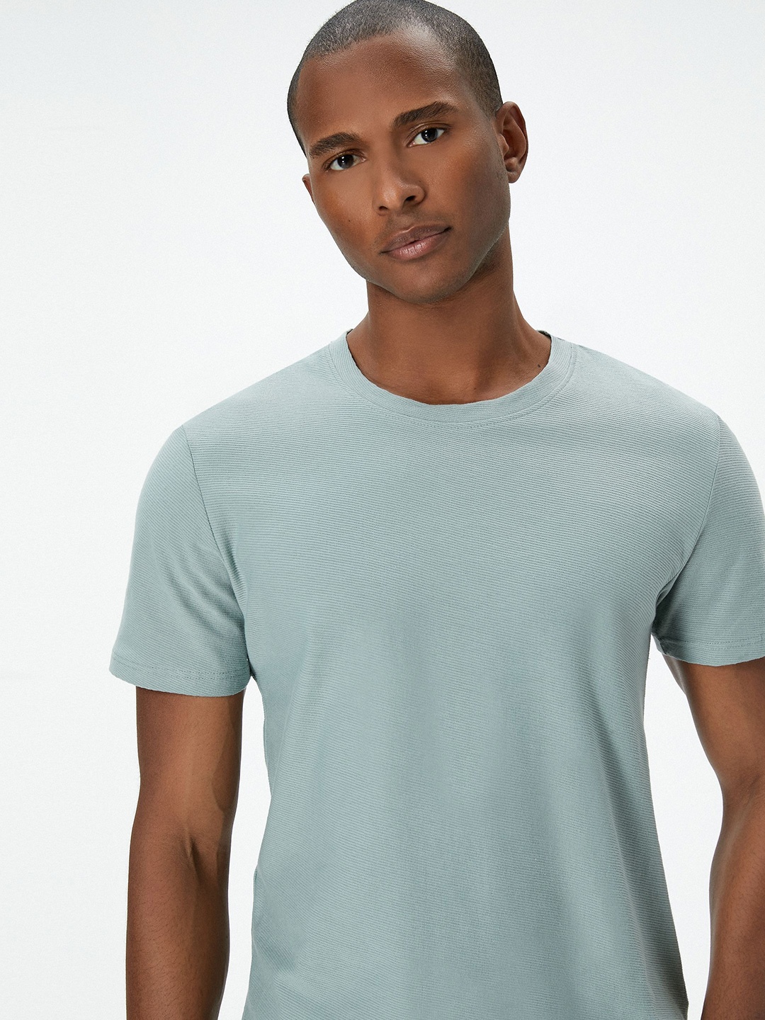 

Koton Men Solid Round Neck T-shirt, Blue