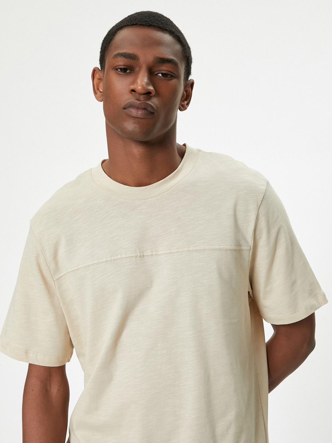 

Koton Men Solid Round Neck T-shirt, Beige
