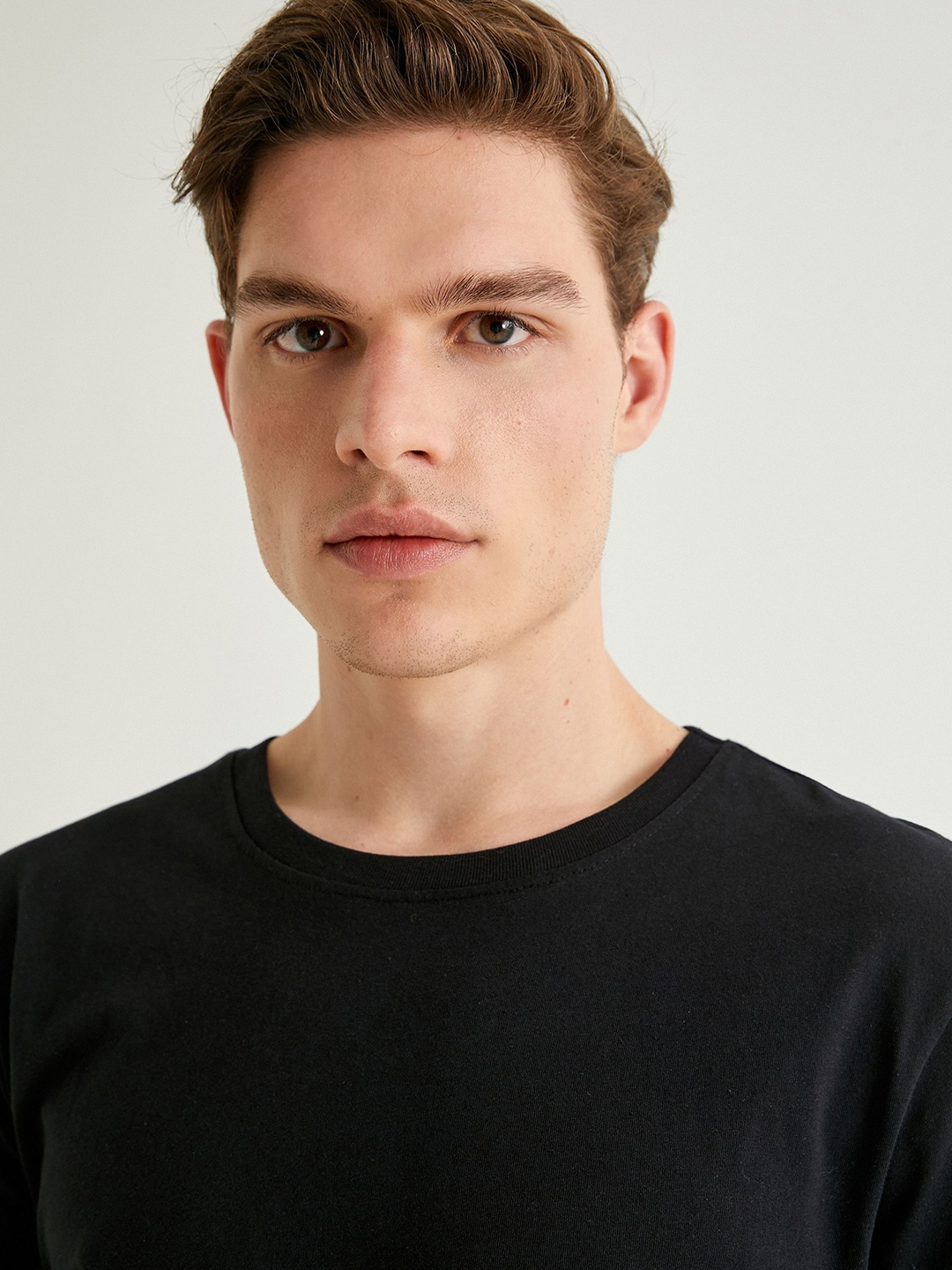 

Koton Men Round Neck Solid Pure Cotton T-shirt, Black