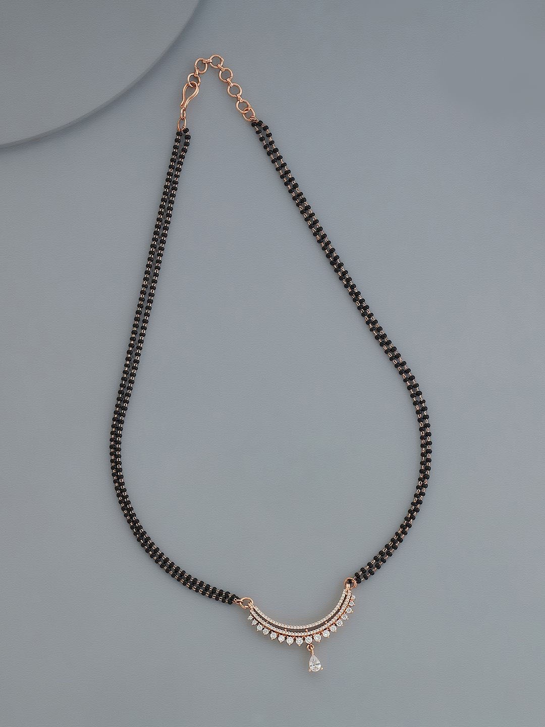 

Kushal's Fashion Jewellery Rose Gold-Plated Zircon Studded Mangalsutra